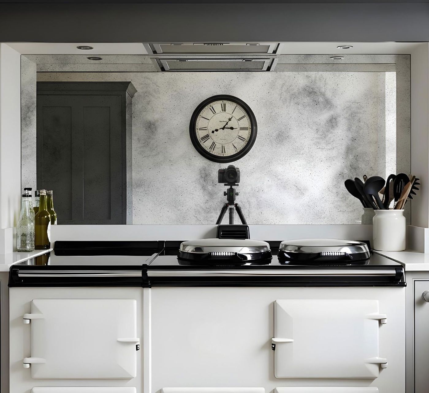 Antique mirror splashback behind a range cooker