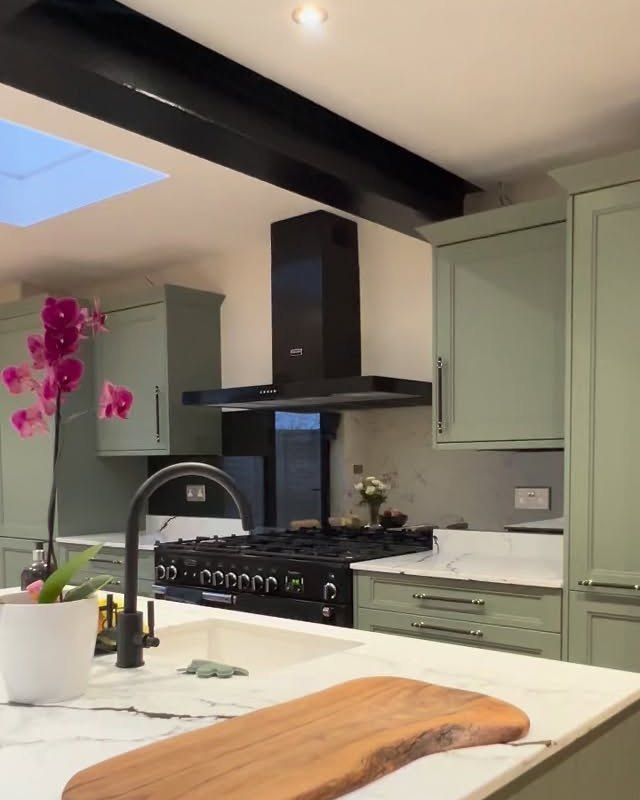Sage green kitchen, fitted by Marvell Glass